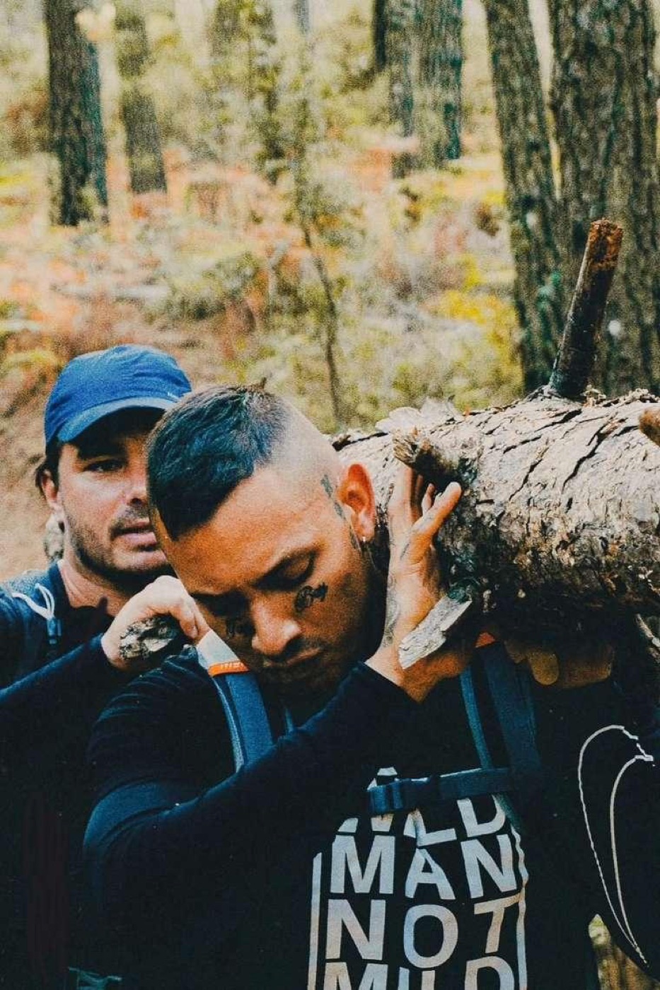 Callum coaching under the log carry