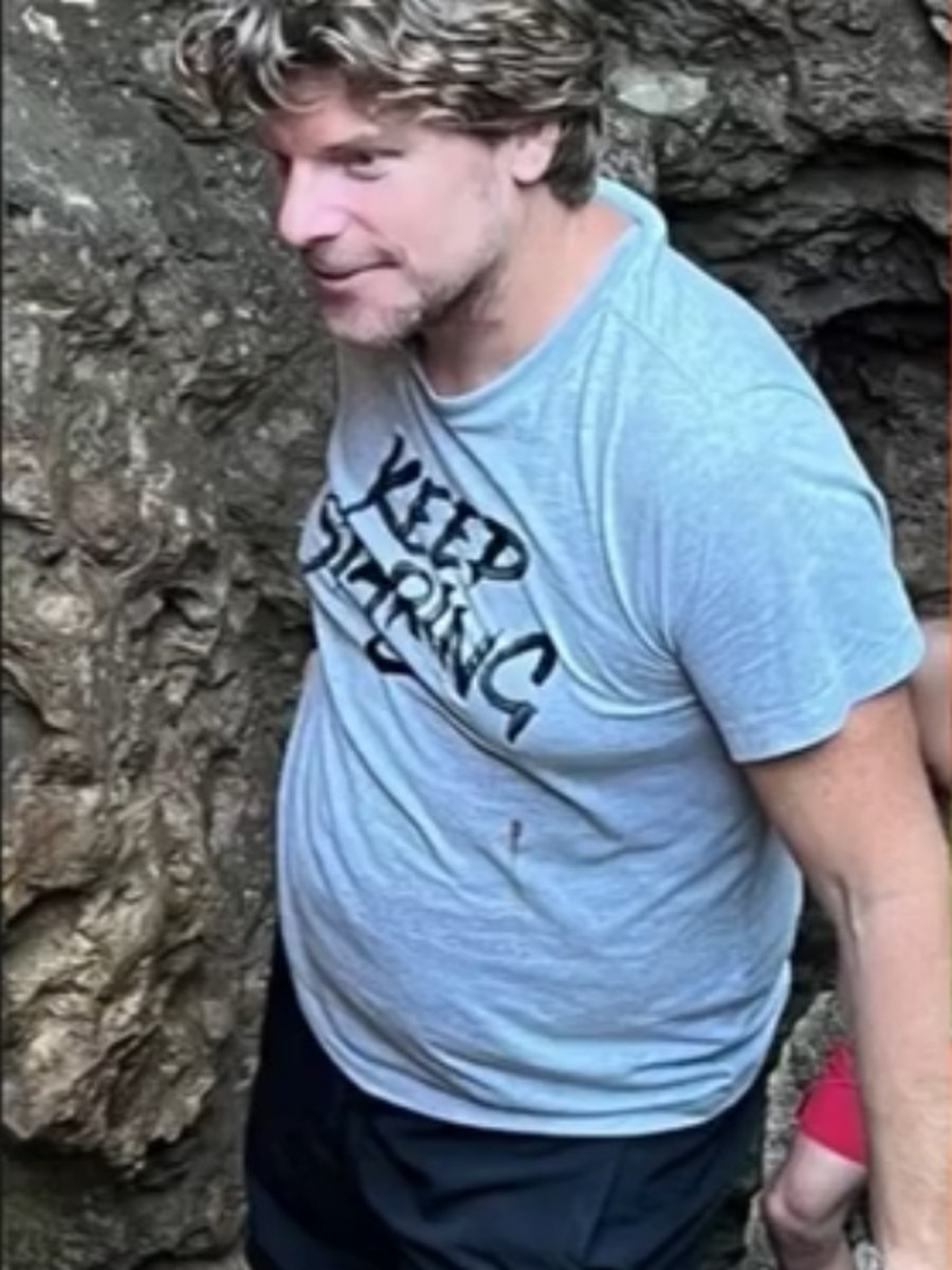 Maarten before FIT10, in a grey tee on the rocks